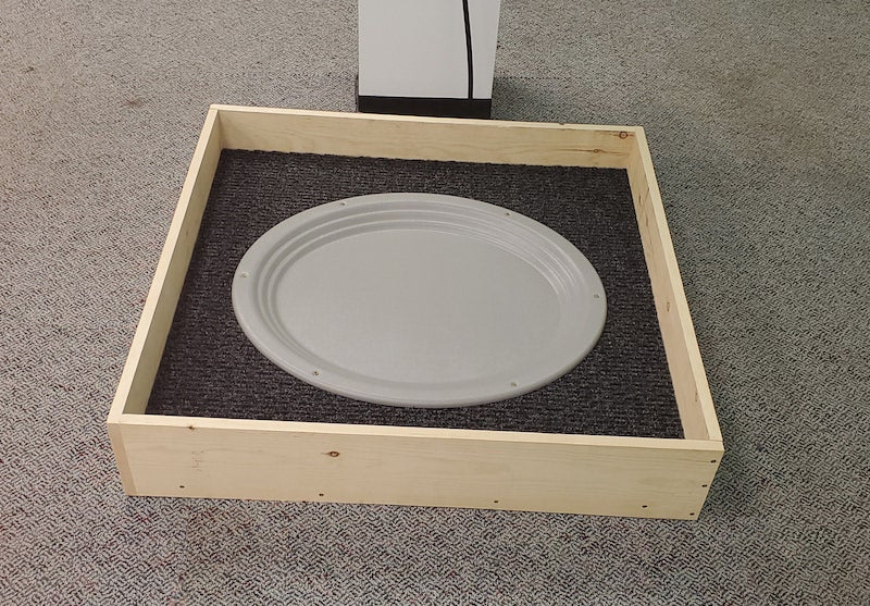 The whelping nest is designed to be placed in a whelping box with a cut- out template on the shipping box